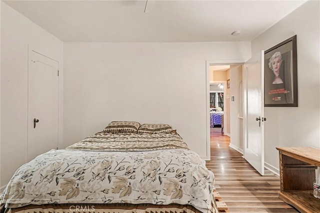 bedroom featuring hardwood / wood-style floors