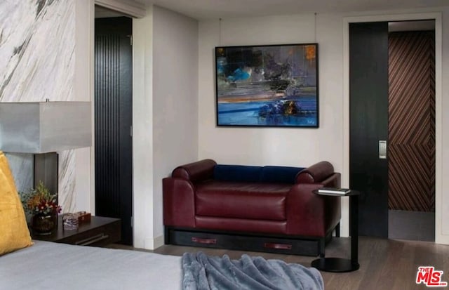 bedroom featuring hardwood / wood-style floors