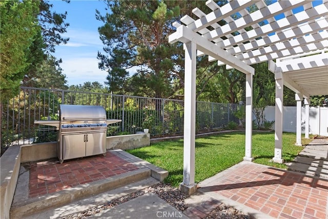 view of patio / terrace with a pergola and grilling area