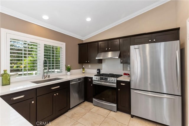 kitchen with sink, stainless steel appliances, crown molding, lofted ceiling, and light tile patterned flooring