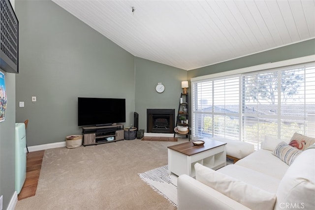 living room featuring carpet floors, lofted ceiling, and wooden ceiling