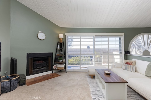 living room with wood ceiling and light carpet