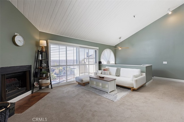 living room with wood ceiling, light carpet, ceiling fan, and high vaulted ceiling