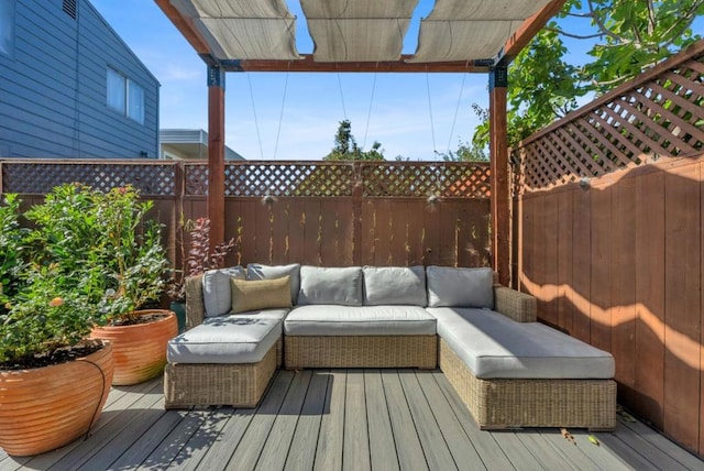 wooden terrace featuring an outdoor hangout area