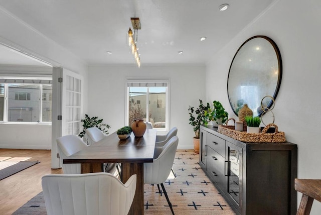 dining area with light hardwood / wood-style floors