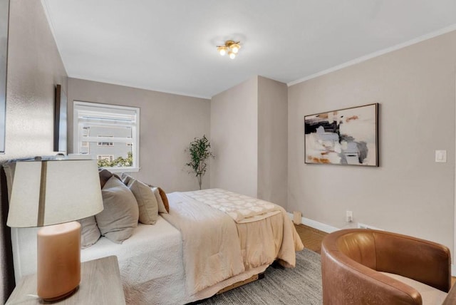 bedroom with ornamental molding