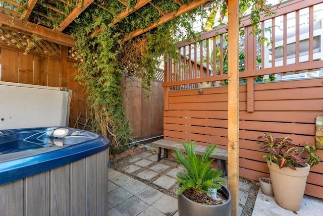 view of patio featuring a hot tub