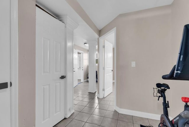 workout room with light tile patterned floors