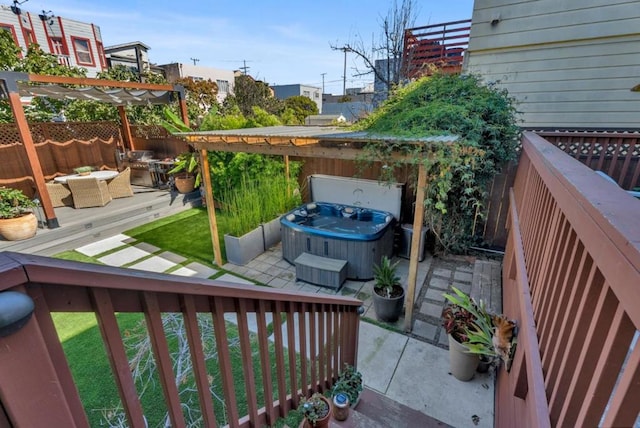 wooden balcony with a pergola, a hot tub, a patio area, and a wooden deck