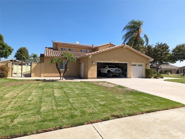 view of front of property with a front yard and a garage