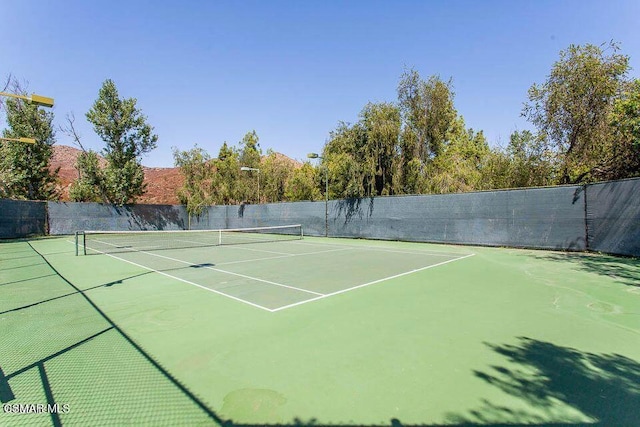 view of sport court with basketball court