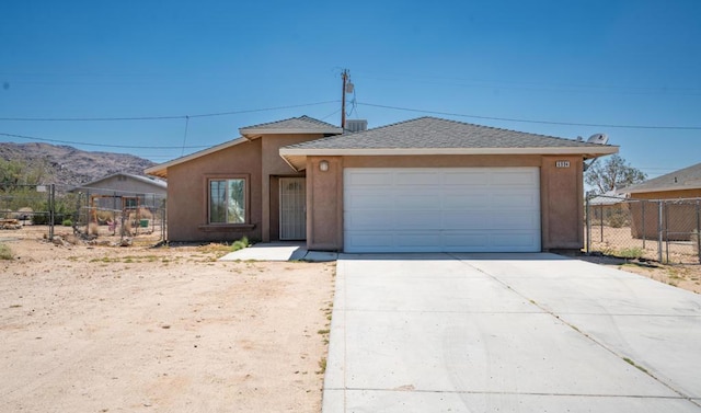 single story home with a garage