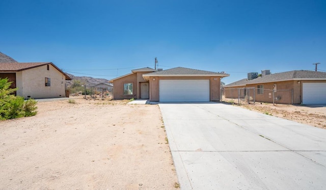 ranch-style house with a garage