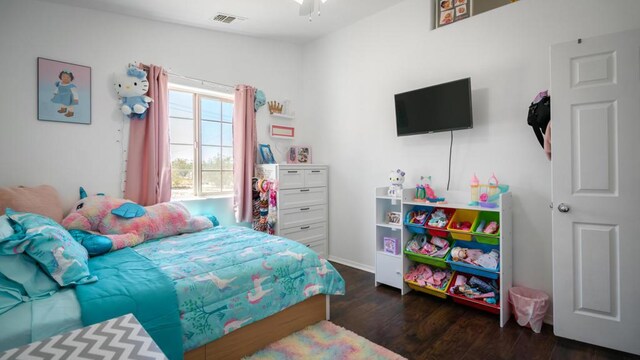 bedroom featuring dark wood-type flooring