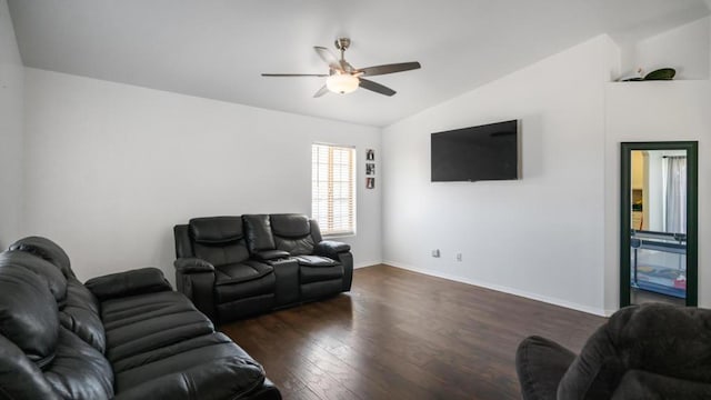 living room featuring ceiling fan, lofted ceiling, and dark wood-type flooring