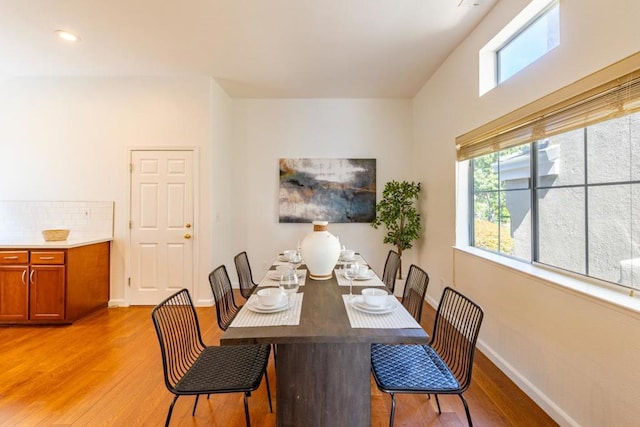 dining space featuring light hardwood / wood-style floors