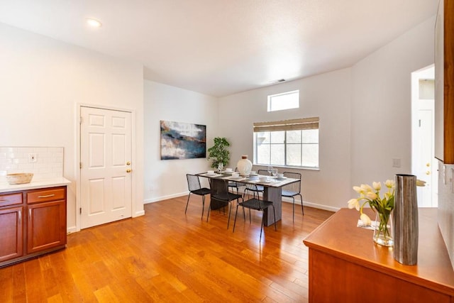 dining space featuring light hardwood / wood-style flooring