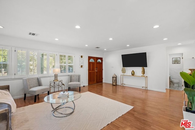 living room featuring light hardwood / wood-style floors