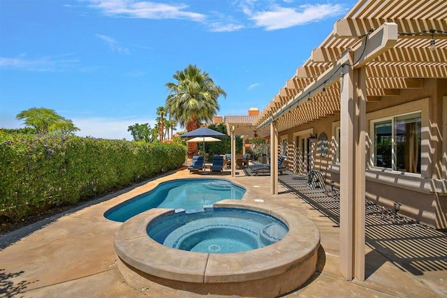 view of swimming pool featuring a patio area, a pergola, and an in ground hot tub