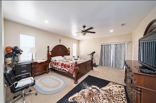 carpeted bedroom with ceiling fan