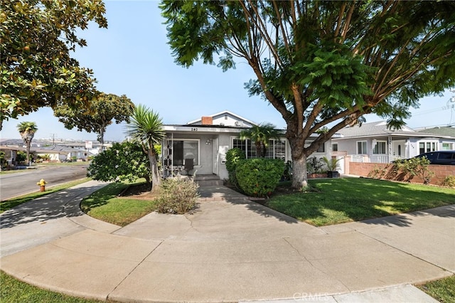 view of front of house with a front lawn