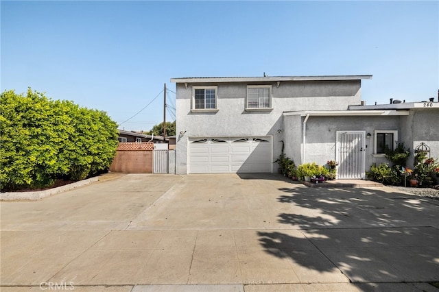 view of side of home featuring a garage