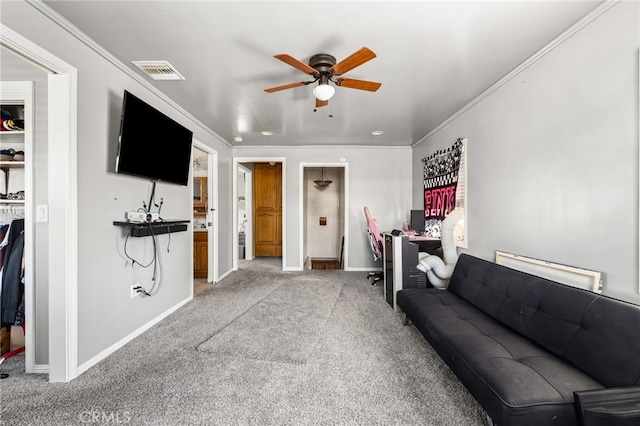 living room featuring ceiling fan, light carpet, and crown molding