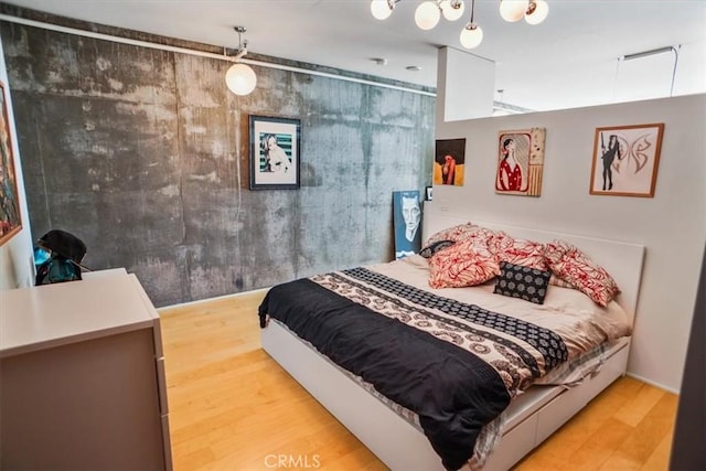 bedroom featuring light hardwood / wood-style floors