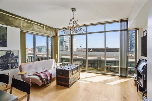 1100 S Hope St Unit 1507, Los Angeles, CA 90015 - sunroom featuring a city view and a chandelier