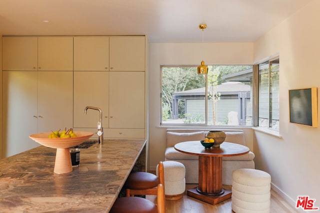 dining area featuring light wood-type flooring