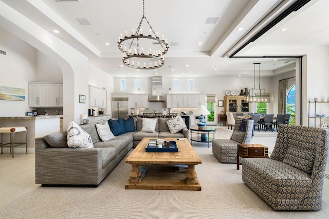 living room featuring a chandelier