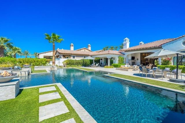 view of swimming pool with a patio