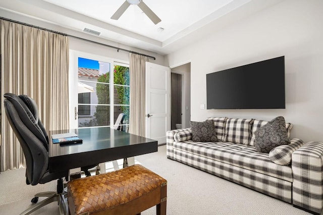 home office featuring carpet floors and ceiling fan