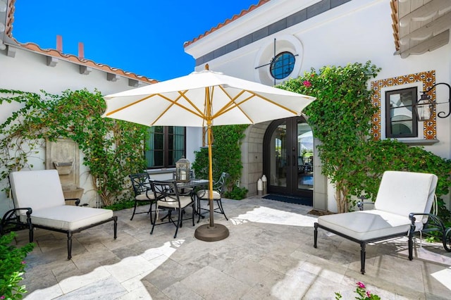 view of patio featuring french doors