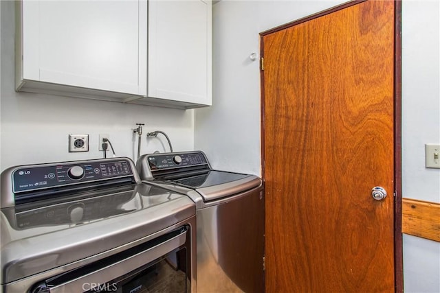 30421 Live Oak Dr, Running Springs, CA 92382 - laundry area with washing machine and clothes dryer and cabinet space
