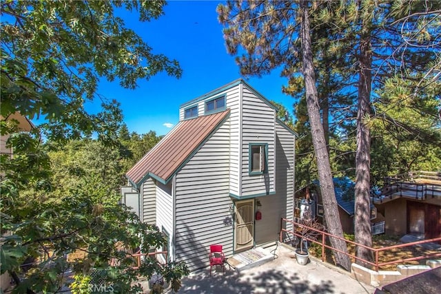 30421 Live Oak Dr, Running Springs, CA 92382 - view of side of property with metal roof