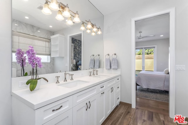 bathroom featuring vanity and hardwood / wood-style floors