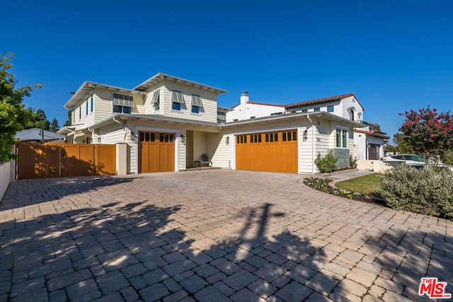 view of front of home with a garage