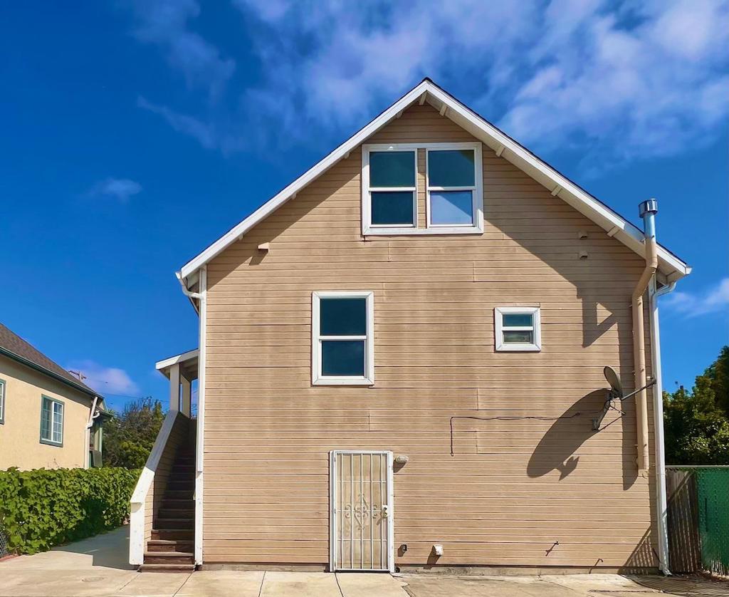 back of property featuring a patio area