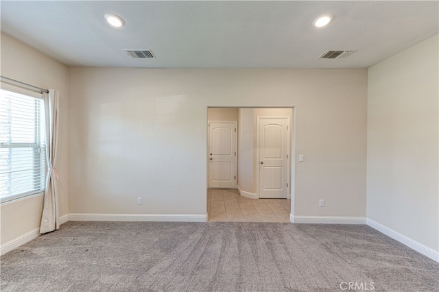 view of carpeted spare room