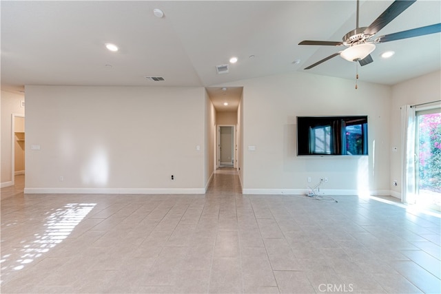 empty room with vaulted ceiling and ceiling fan