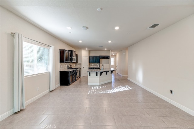 living room featuring light tile patterned floors