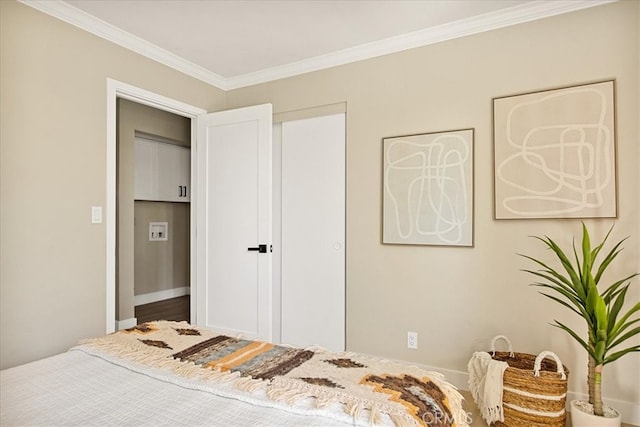 bedroom featuring crown molding