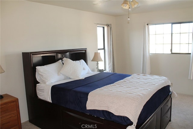 bedroom with carpet and ceiling fan