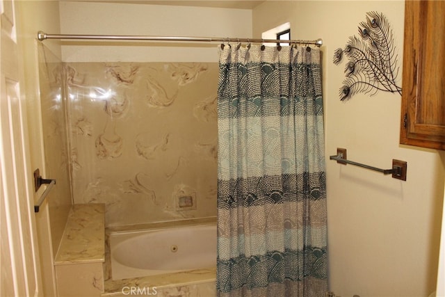 bathroom with shower / bathtub combination with curtain