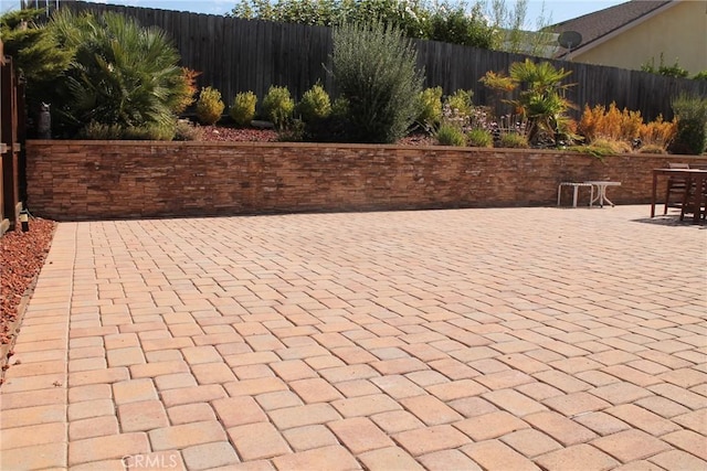 view of patio with fence