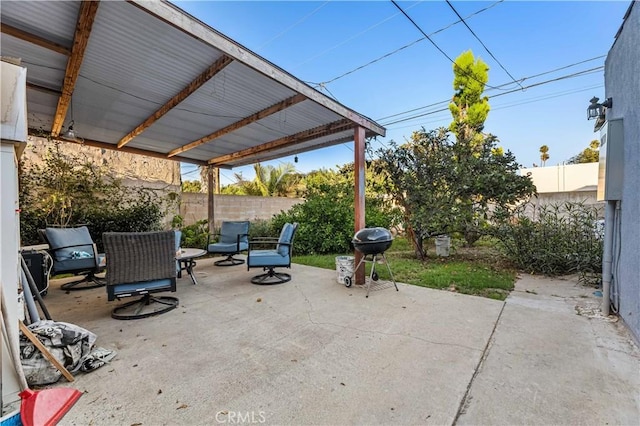 view of patio featuring a grill