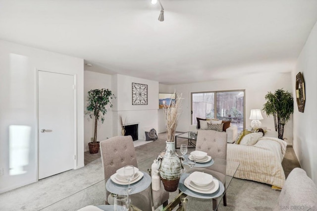 view of carpeted dining area