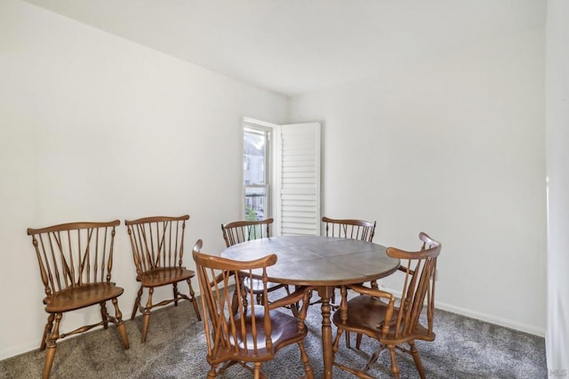 view of carpeted dining area