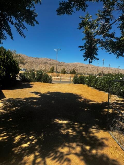 view of yard with a mountain view